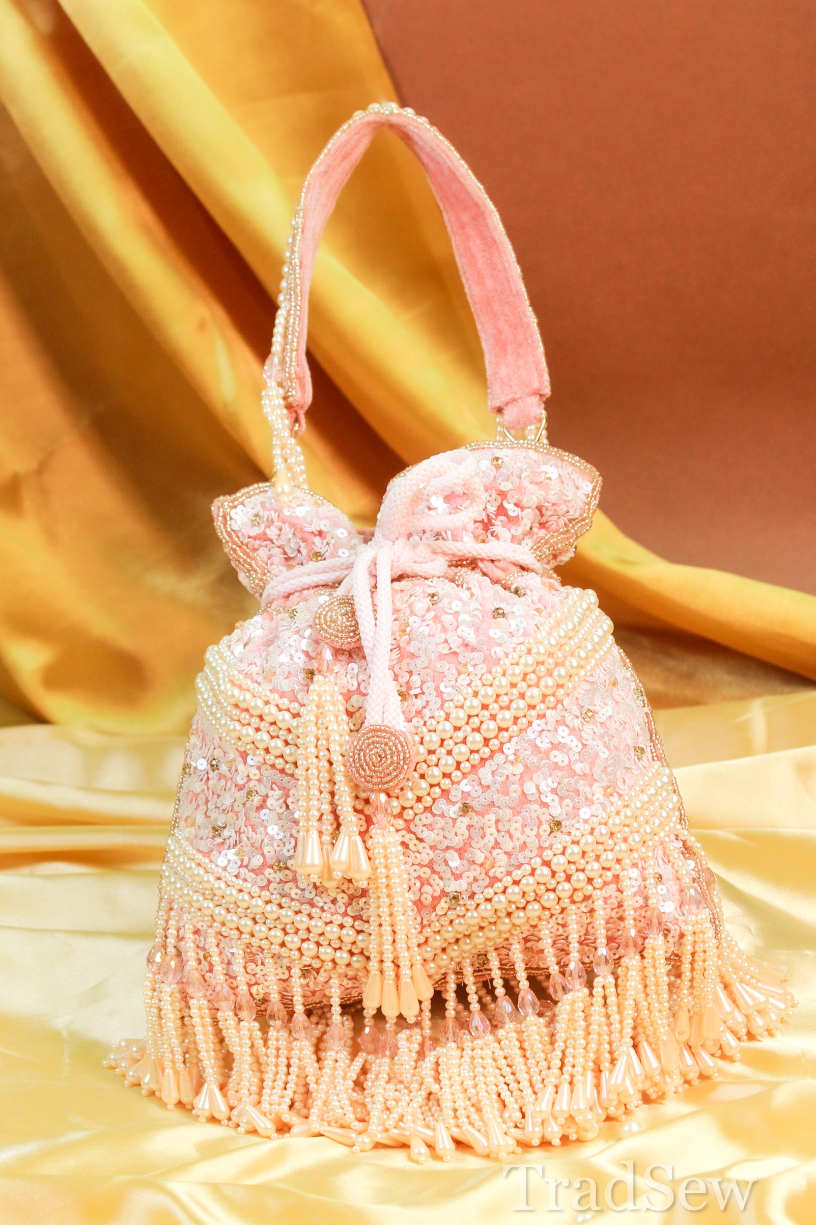 Amayra Pink Potli Handcrafted Designer Handbag for Women – TradSew