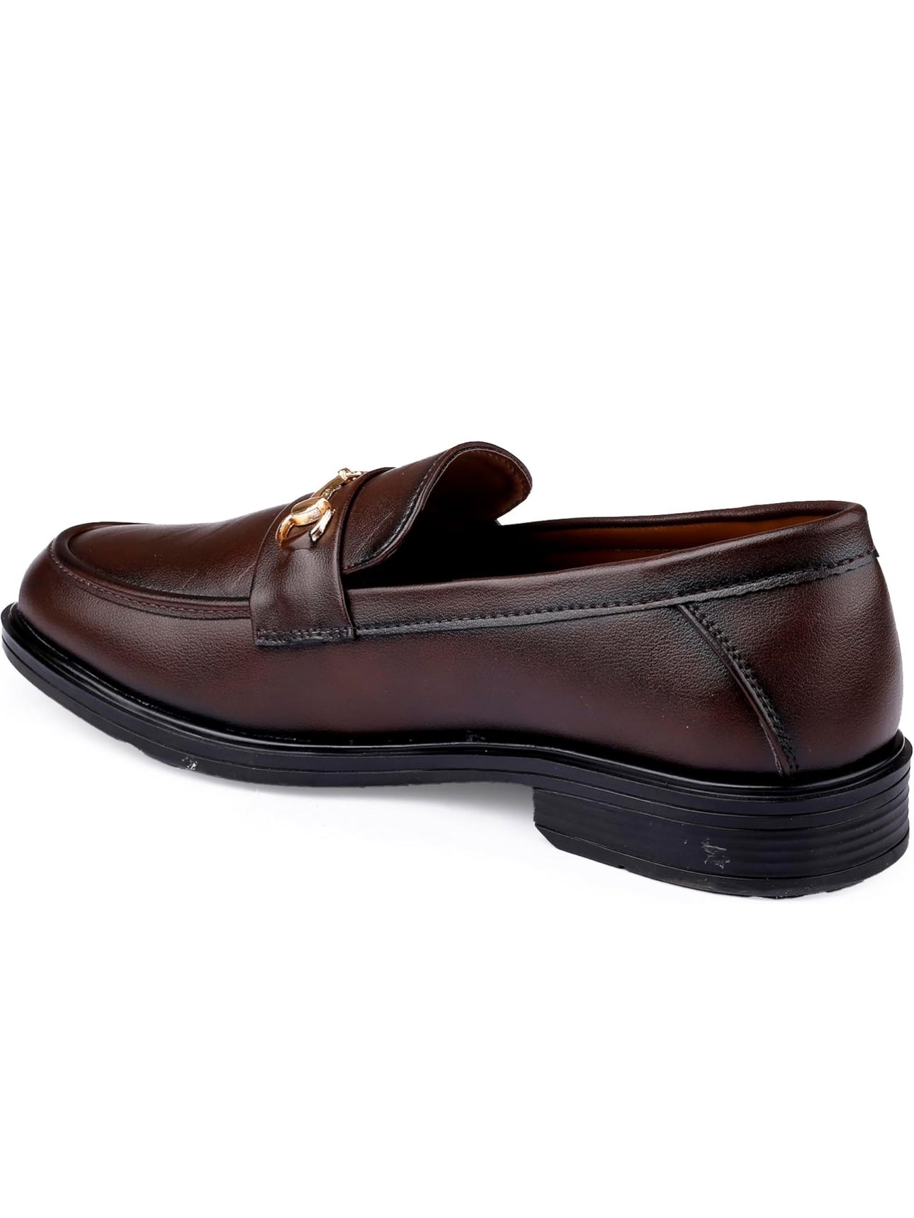 Brown leather loafer with a gold buckle on a white background