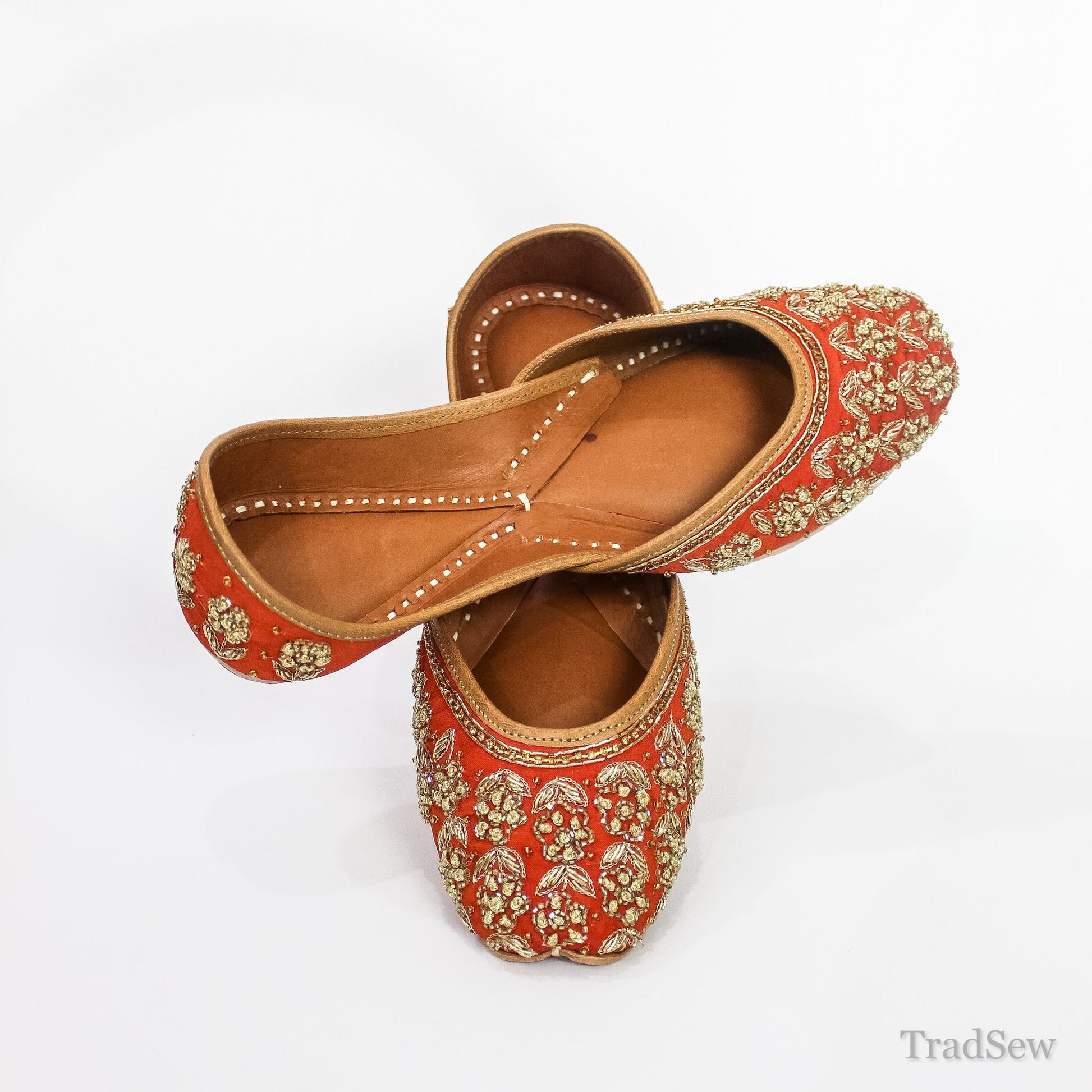 Traditional Red & Gold Ornate Leather Juttis by Tradsew