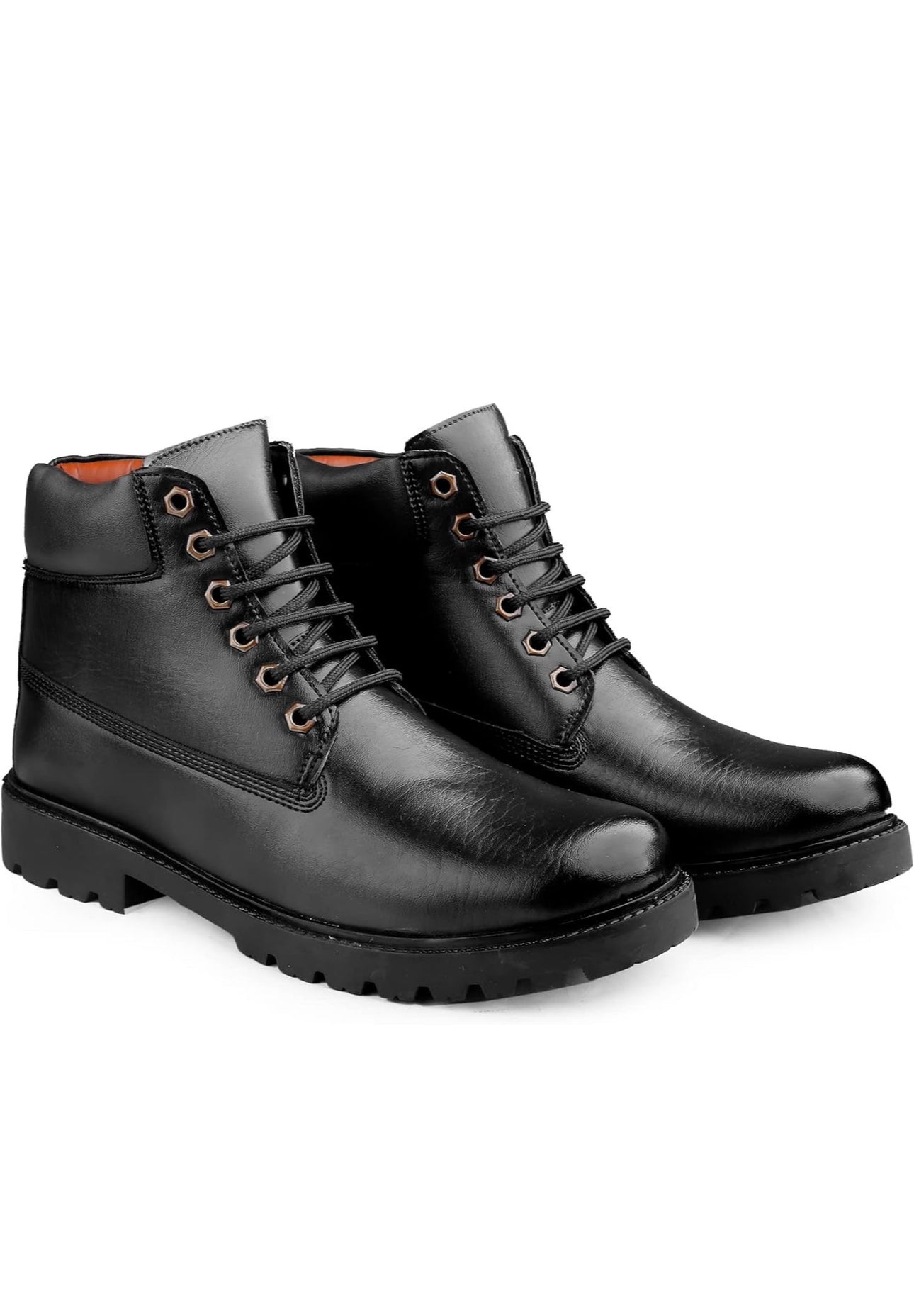 Pair of black leather boots on a white background