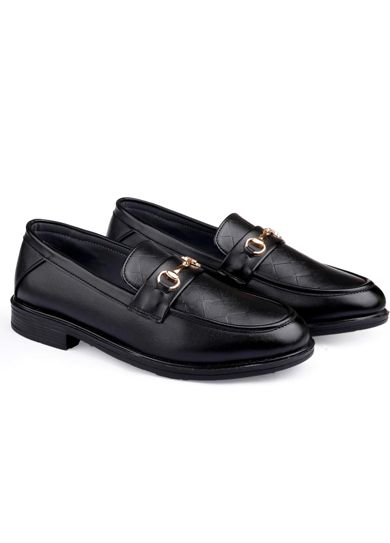 Pair of black loafers with gold accents on a white background