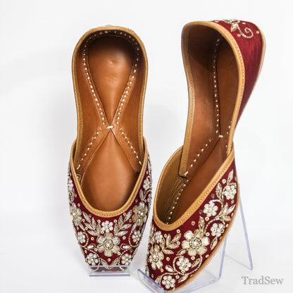 Opulent Maroon Gold-Threaded Leather Juttis by Tradsew