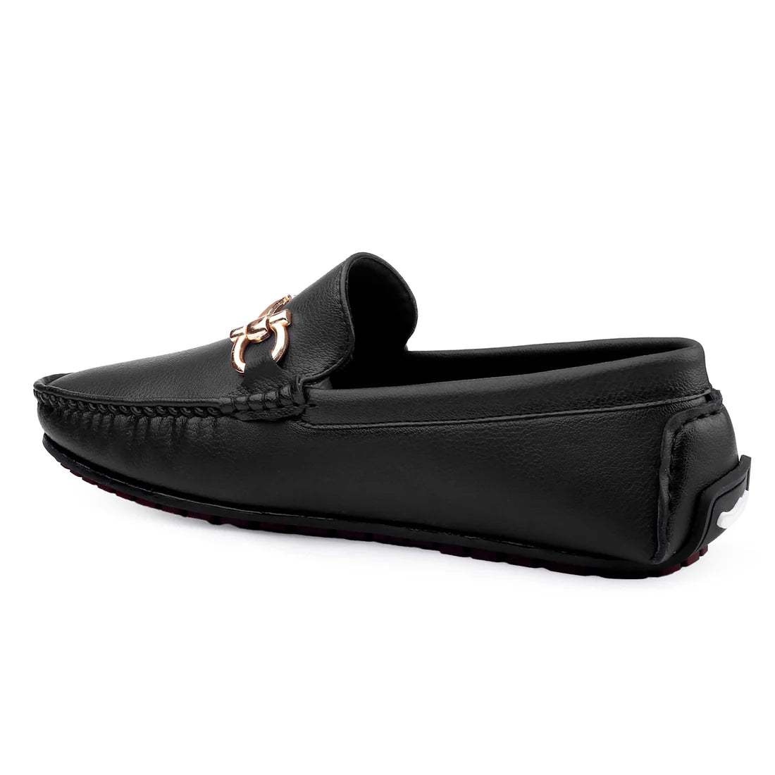 Black loafer with a metal embellishment on the strap and a round toe style.