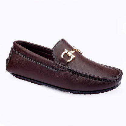 Brown loafer with a gold buckle on a white background