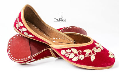 Red jutti with golden embroidery design by Tradsew