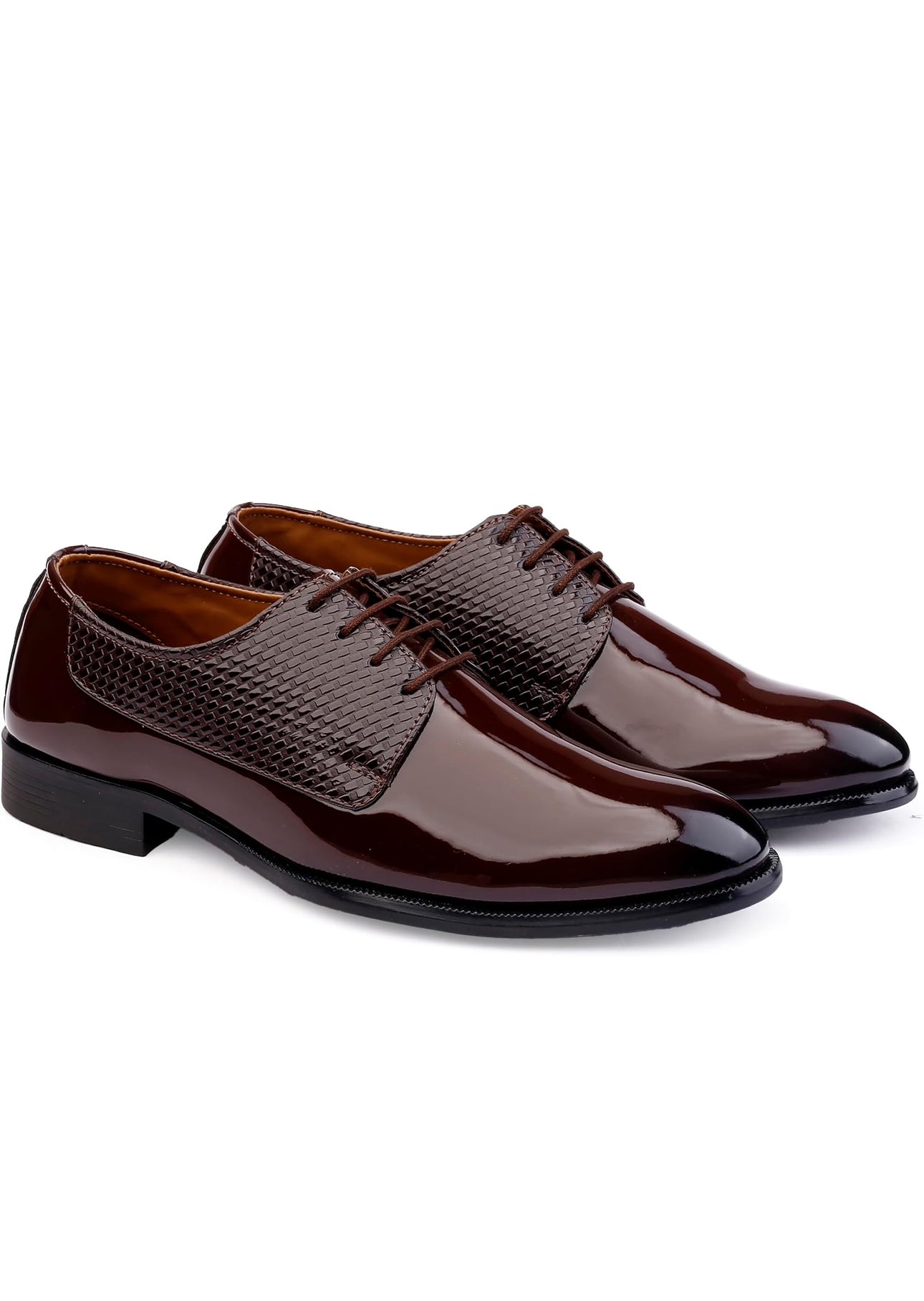 Pair of brown dress shoes on a white background