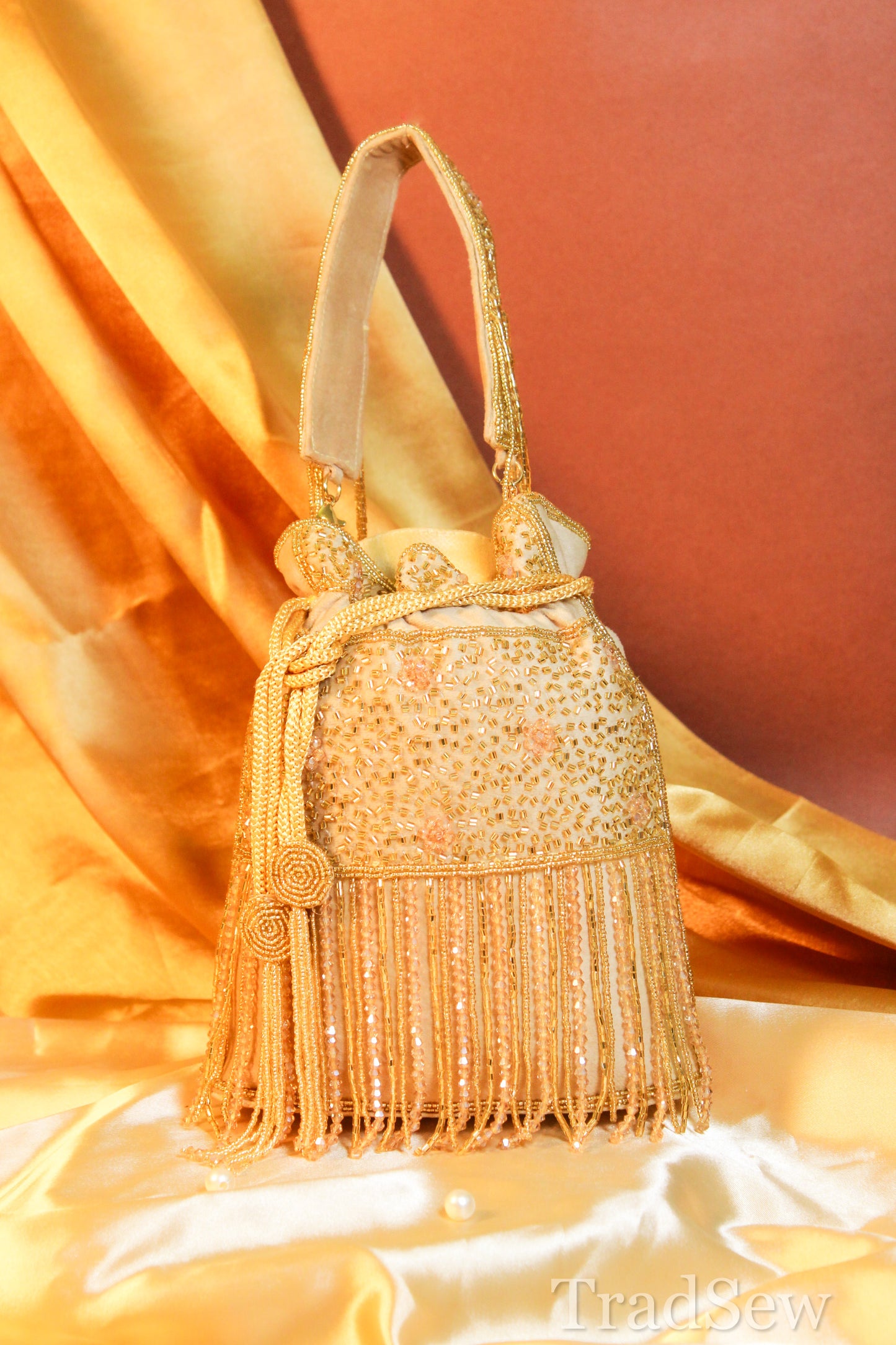 Trisha Peach Designer Handcrafted Potli For Women